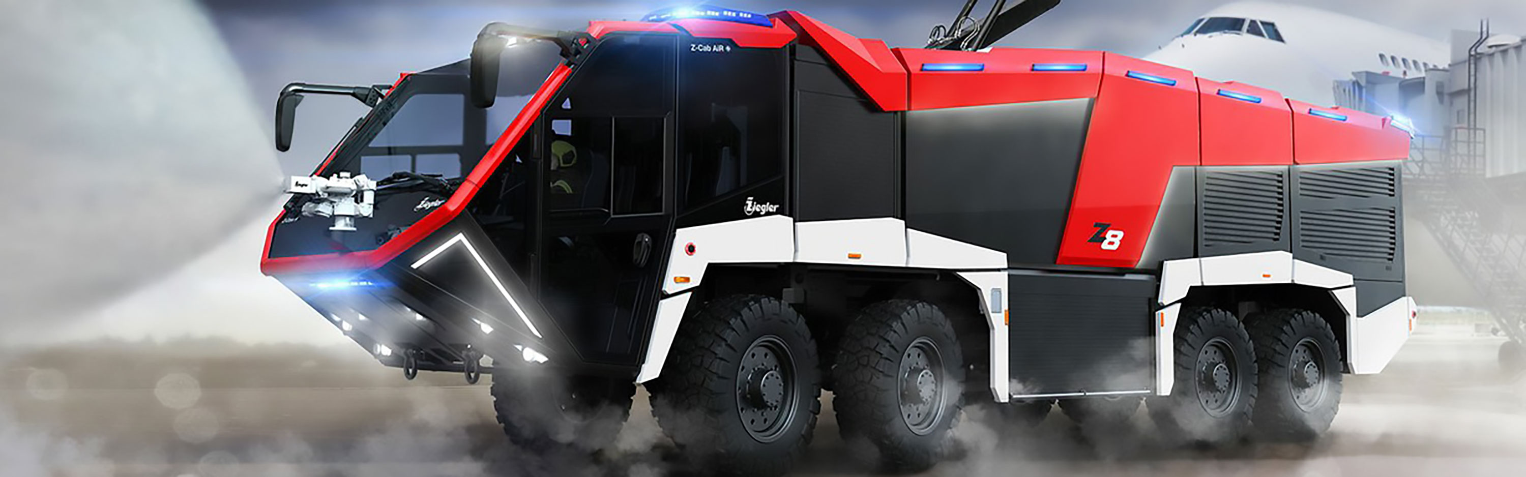 Futuristic airport firefighting vehicle in action, spraying water with its mounted cannons, featuring a sleek black and red design, illuminated by blue emergency lights.